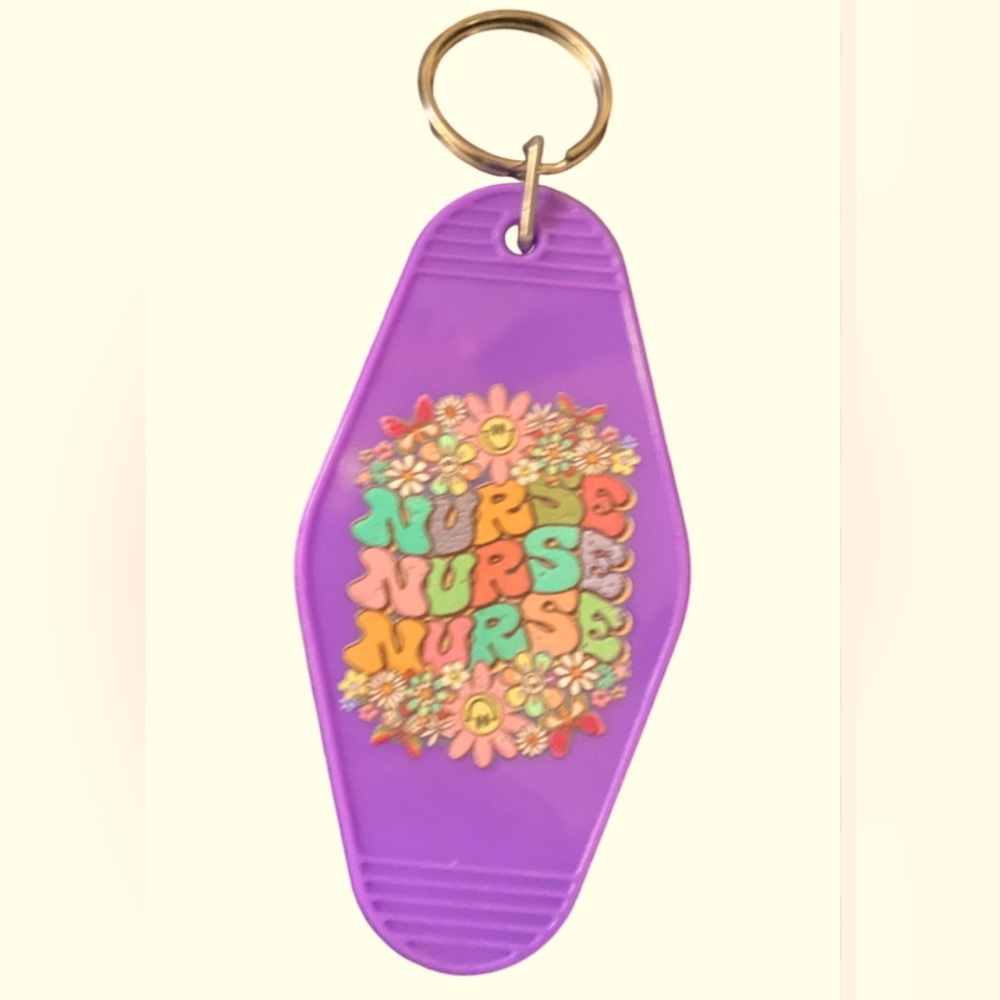 Cute NURSE  motel keychain! Lavender Color Plastic shape rounded diamond